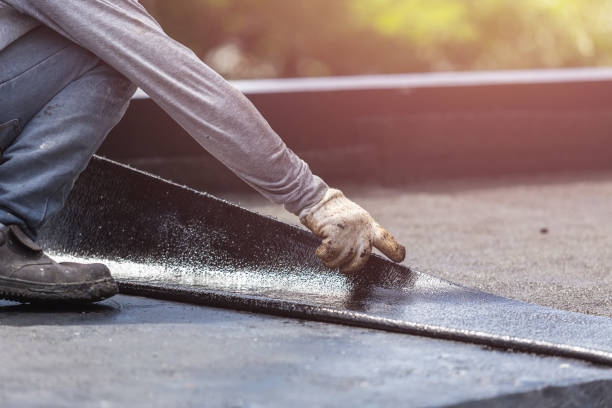 Professional Waterproofing technician working in Manitowoc, WI